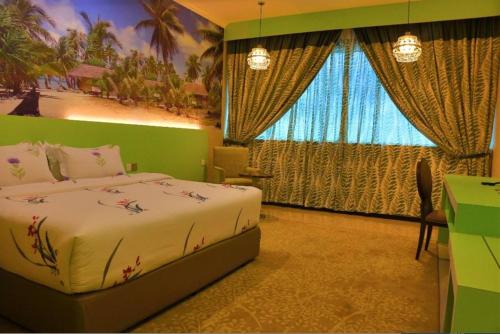 a bedroom with a bed with a painting on the wall at Hotel Holmes Gp in Nusajaya