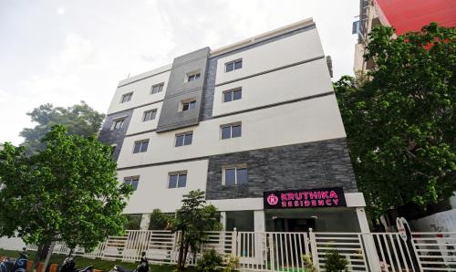 an image of the building of the hotel at Treebo Trend Kruthika Residency in Hyderabad