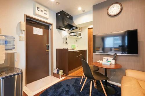 Keigen buildingにあるテレビまたはエンターテインメントセンター