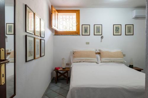 Posteľ alebo postele v izbe v ubytovaní Villa Belvedere-appartamento Family