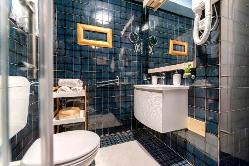Ett badrum på Apartments Villa Rossella 1
