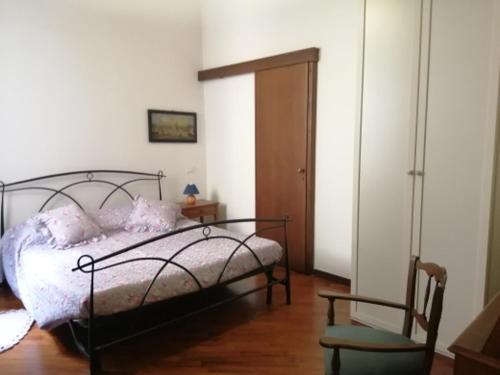 Giường trong phòng chung tại Borgo Creativo