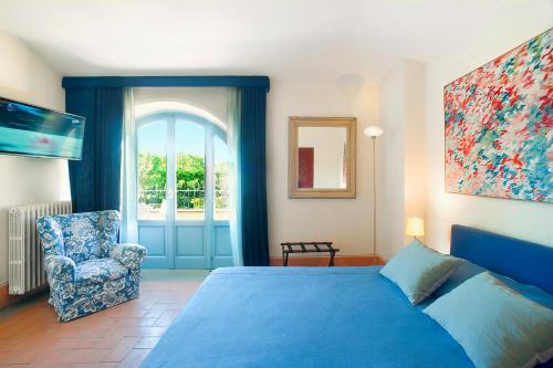 En eller flere senger på et rom på Residenza Ca De Frati