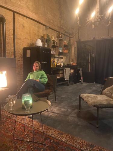 Ein Sitzbereich in der Unterkunft B&B Vennehoeve