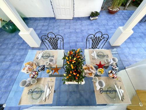 an overhead view of a table with a christmas tree on it at La Bicocca di Annavì in Ischia