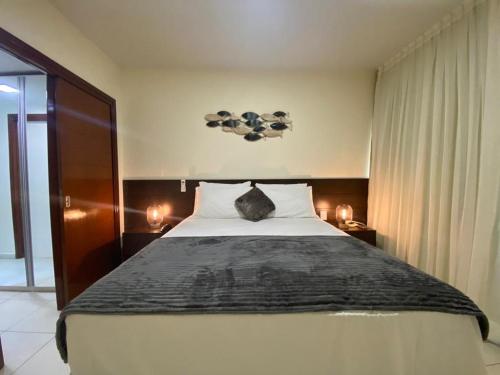 A bed or beds in a room at Flat Beira Mar- Ap 306 #ELEGANCE