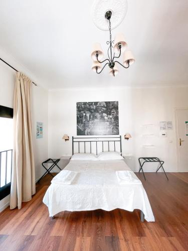 Ein Bett oder Betten in einem Zimmer der Unterkunft Ostello Bello Napoli