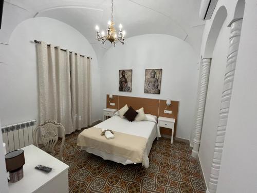 Кровать или кровати в номере Casa Rural "Laplaza23"