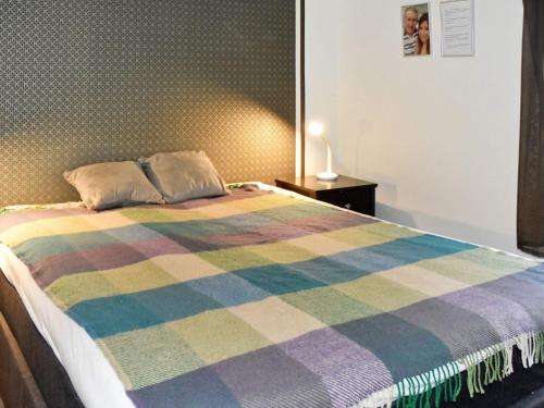 Postel nebo postele na pokoji v ubytování Holiday home Gursken