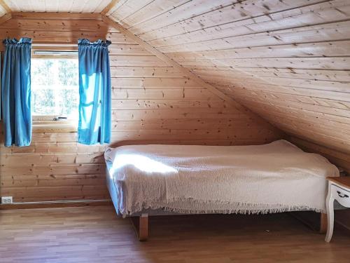 Voodi või voodid majutusasutuse Holiday home Tranøy toas