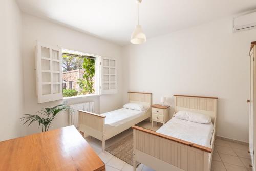 A bed or beds in a room at Villa Patrizia