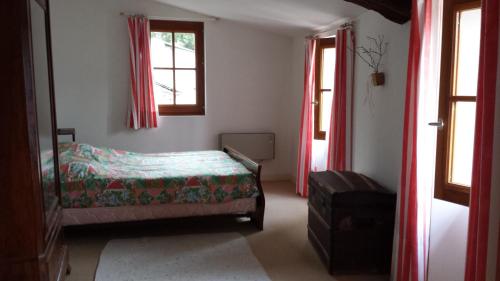 Posteľ alebo postele v izbe v ubytovaní La maison de grand-mère Angèle