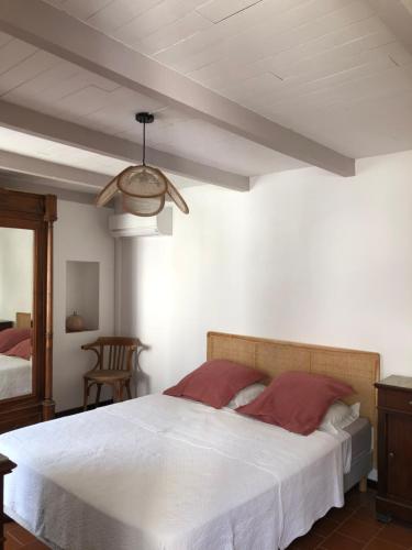 Säng eller sängar i ett rum på Chez Jean Nonza