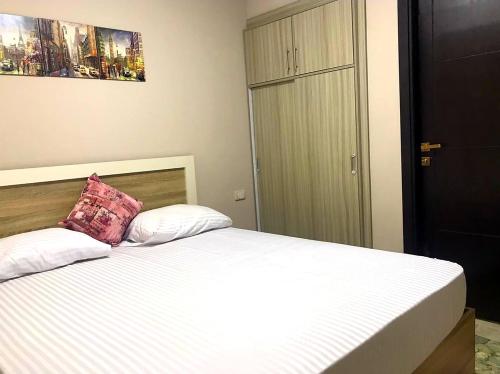 Кровать или кровати в номере porto marina panoramica sea view