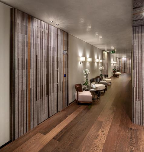 a lobby with a row of chairs and tables at Principe Forte Dei Marmi - Resort & Spa in Forte dei Marmi