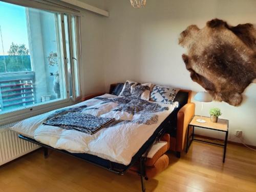 Postel nebo postele na pokoji v ubytování Pohjanpuistikko Apartment