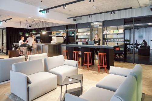 Ein Restaurant oder anderes Speiselokal in der Unterkunft NEU RESIDENCES smart stay 