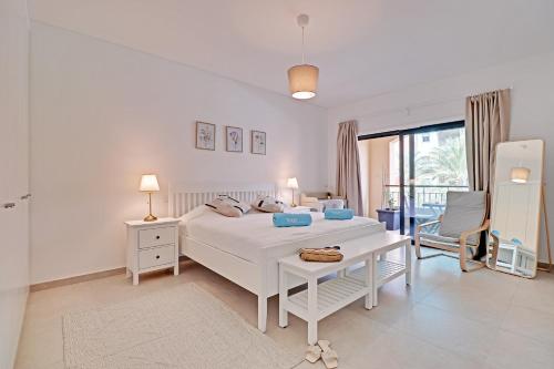 Postel nebo postele na pokoji v ubytování Andiamo Apartment