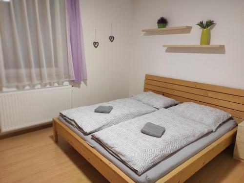 Postel nebo postele na pokoji v ubytování Prázdninový dům Bezkov u Znojma