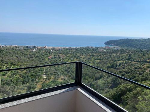 a view of the ocean from a balcony at Wait 'n Sea in Himare