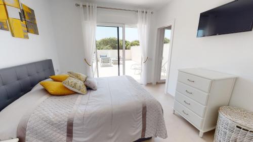 En eller flere senge i et værelse på Villa Higinio - A Murcia Holiday Rentals Property
