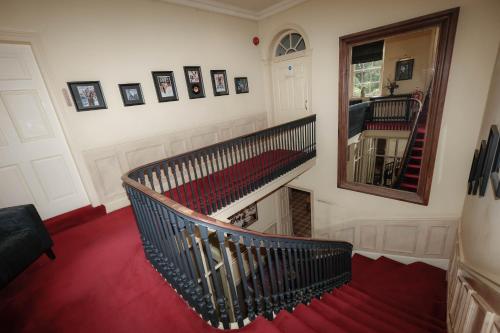 a stairway leading to a room with a staircase at York Pavilion Hotel, Sure Hotel Collection by Best Western in York