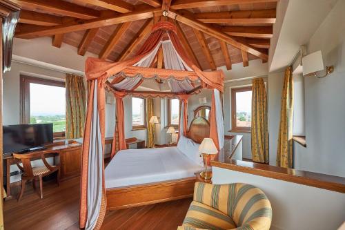 Posteľ alebo postele v izbe v ubytovaní Relais Santo Stefano