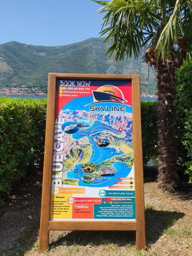 a sign for the disneyland splash line at La Grande Apartments in Kotor
