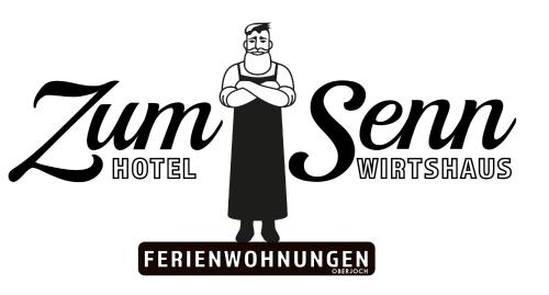 un hombre de pie con los brazos cruzados y las palabras numtienemp hotel y ella en Zum Senn - Hotel und Wirtshaus, en Bad Hindelang