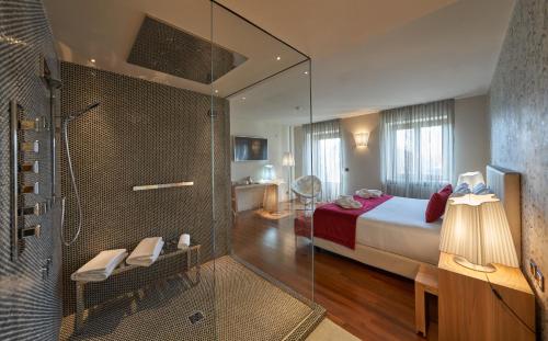 Posteľ alebo postele v izbe v ubytovaní Relais Santo Stefano