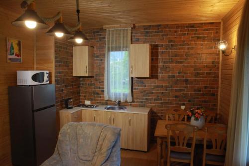 Majoituspaikan Cottage Woodside keittiö tai keittotila