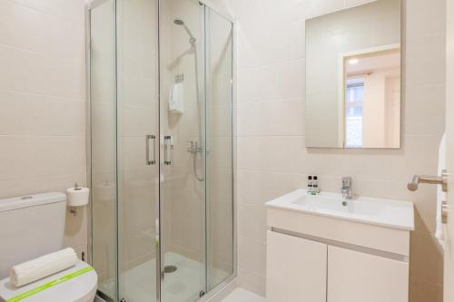 Koupelna v ubytování Villa Apartments & Suites