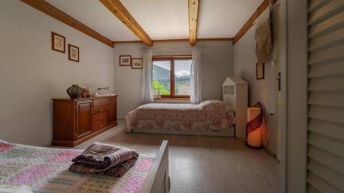Posteľ alebo postele v izbe v ubytovaní Charming Holiday House in Velika Lesnica