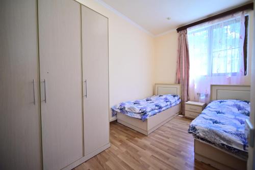 Postel nebo postele na pokoji v ubytování Sevan Comfortable Cottages by SeaSide