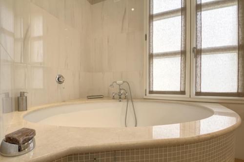 Ett badrum på Alassio bnb Apartments