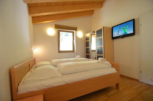 Posteľ alebo postele v izbe v ubytovaní Ski Chalet Jim by All in One Apartments