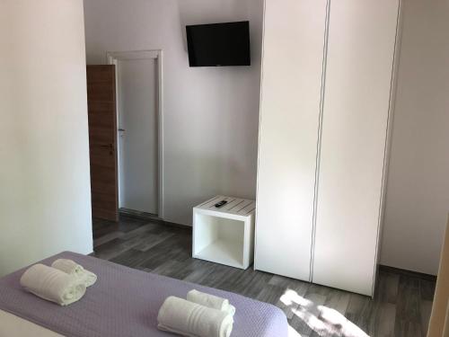 TV a/nebo společenská místnost v ubytování Vinsea Hotel
