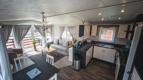 an aerial view of a kitchen and a living room at Angie's Haven, Superb 2 Bedroom Lodge with Hot Tub - Sleeps 6 - Felmoor Park in Morpeth