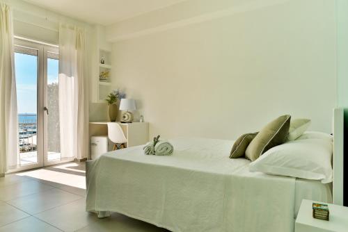 Ein Bett oder Betten in einem Zimmer der Unterkunft Quasi in Porto