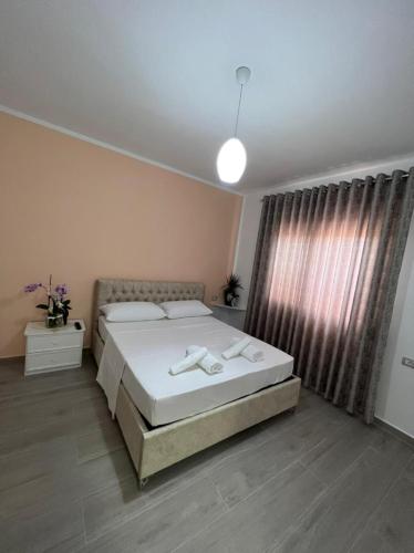 Postel nebo postele na pokoji v ubytování Fiori Rooms