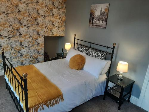 Ένα ή περισσότερα κρεβάτια σε δωμάτιο στο Woldgate Retreat Bridlington