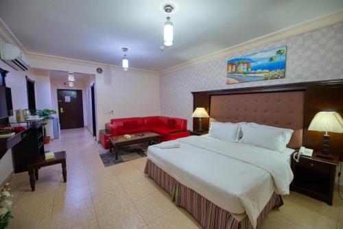 Кровать или кровати в номере Al Fanar Al Alami 2- Haya'a malakeya