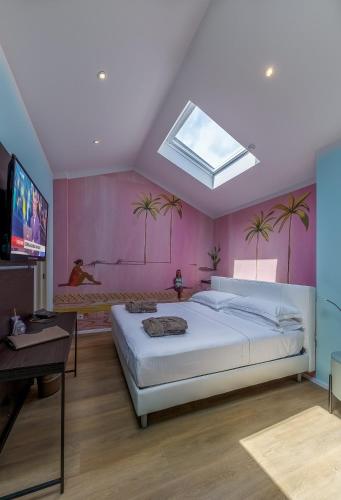 Télévision ou salle de divertissement dans l'établissement Hotel Residence Esplanade