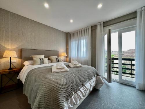 Ένα ή περισσότερα κρεβάτια σε δωμάτιο στο Fonte da Vila 5