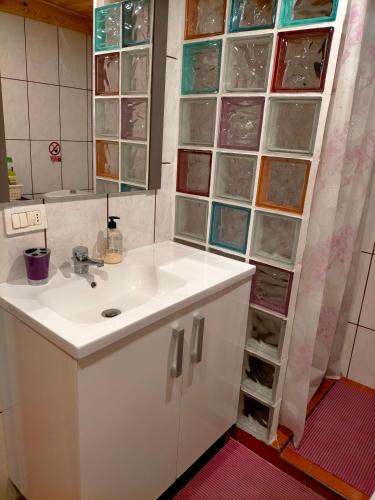 a bathroom with a sink and a mirror at Casa Lourdes in La Guancha