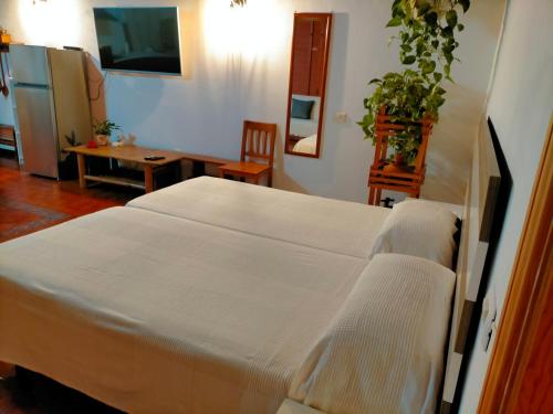 Tempat tidur dalam kamar di Casa Lourdes