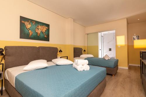 Postel nebo postele na pokoji v ubytování Dunlin Hotel