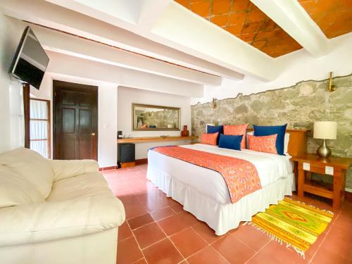 En eller flere senger på et rom på Molino de los Reyes By Rotamundos