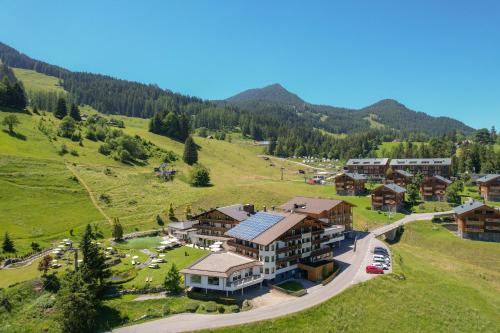 an aerial view of a resort in the mountains at Alpinresort Schillerkopf in Bürserberg