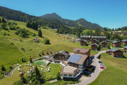 an aerial view of a resort in the mountains at Alpinresort Schillerkopf in Bürserberg
